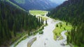 Beautiful mountains with a winding river flowing in the mountains of Kyrgyzstan