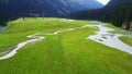 Beautiful mountains with a winding river flowing in the mountains of Kyrgyzstan