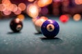 beautiful multi-colored balls with numbers lie under the light of lamps on the pool table. Royalty Free Stock Photo