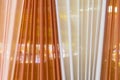 Beautiful multi-colored curtains decorated as a backdrop for the Buddhist ceremonies in Southeast Asia. Fabric colour and texture