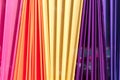 Beautiful multi-colored curtains decorated as a backdrop for the Buddhist ceremonies in Southeast Asia. Fabric colour and texture