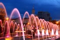 Beautiful multi-colored fountain in the city Dnepr at night (Dnepropetrovsk), Ukraine. Royalty Free Stock Photo