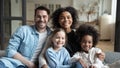 Beautiful multi-ethnic kids and their parents family portrait Royalty Free Stock Photo