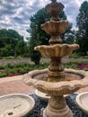 Colorful flowers and water fountain at botanical garden Royalty Free Stock Photo
