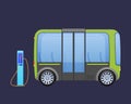 Beautiful multi-seat electric bus, autobus near city`s charging electric station.