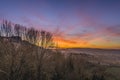 Beautiful multicolor sunset over countryside landscape