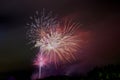 Beautiful multicolored fireworks in the night sky as a background Royalty Free Stock Photo