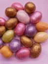 beautiful multicolored nut candy in chocolate colored glaze. Royalty Free Stock Photo