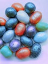 beautiful multicolored nut candy in chocolate colored glaze. Royalty Free Stock Photo