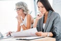 beautiful multicultural businesswomen working