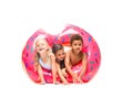 multiethnic kids with swim tube