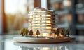 Beautiful multistorey eco-house with balconies project miniature presentation model with small trees, sidewalks and street roads.