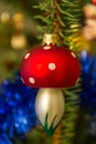 Beautiful mushroom ornament hanging on a Christmas tree Royalty Free Stock Photo