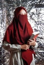 beautiful Muslim model wearing red clothes