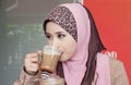 Beautiful muslim woman and coffee