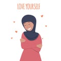 Beautiful Muslim woman hugs herself. Self-love concept.