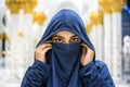 Beautiful Muslim woman wearing Arabic clothes at Sheikh Zayed Grand Mosque in Abu Dhabi Royalty Free Stock Photo