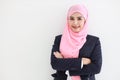 Beautiful muslim young asian woman wearing blue suit smiling confident in studio. Isolated white background portrait