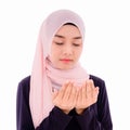 Beautiful muslim young woman wearing hijab and headscarf prayer and praise for allah muslim god Royalty Free Stock Photo