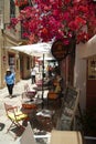 Beautiful Nafplio city, Greece Charming small cafe in a shaded street