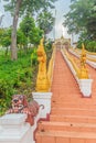 Beautiful nagas staircase upward to the temple at Wat Phra That Chom Sak, thai public Buddhist temple. Located in Mueang, Chiang