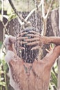 Beautiful naked young woman taking shower in bathroom outside on he luxury villa. Tropical Bali island, Indonesia. Royalty Free Stock Photo