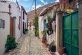 Beautiful narrow alley of a traditional village of Crete Royalty Free Stock Photo