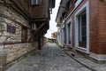 Beautiful and narrow street of the ancient seaside town. Deserted streets in the early morning