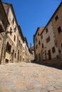 Beautiful narrow street of historic tuscan city Volterra