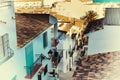 Beautiful narrow street in the old town with white houses and tiled roofs. Altea, Spain Royalty Free Stock Photo