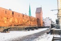 Beautiful narrow street in Riga Old Town with Swedish Gate, Jacobs Barracks and ancient defensive medieval walls Royalty Free Stock Photo