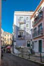 Beautiful narrow streets, houses and shops in the old town of Alfama. Mediterranean, Lisbon, Portugal