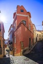 Beautiful narrow streets, houses and shops in the old town of Alfama. Mediterranean, Lisbon, Portugal