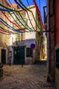 Beautiful narrow streets, houses and shops in the old town of Alfama. Mediterranean, Lisbon, Portugal