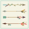 Beautiful native american arrows, feathers and floral decoration Royalty Free Stock Photo