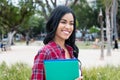 Beautiful native latin american female student outdoors on campus Royalty Free Stock Photo