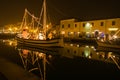 Beautiful nativity scene in the boats in the canal of the city, Italy