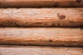 Beautiful Natural background Pattern of a Log Wall. Wooden Log Cabin Wall. Natural Colored Horizontal Background Royalty Free Stock Photo