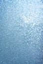Beautiful natural background or texture of frozen transparent glass on the window in winter, extreme cold concept, vertical image Royalty Free Stock Photo