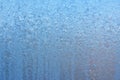 Beautiful natural background or texture of frozen transparent glass on the window in winter, strong cold concept, horizontal image Royalty Free Stock Photo