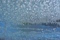 Beautiful natural background or texture of frozen transparent glass on the window in winter, strong cold concept, horizontal image Royalty Free Stock Photo