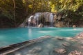 Beautiful natural blue stream waterfall in deep forest tropical jungle Royalty Free Stock Photo