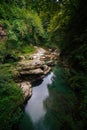 Beautiful natural canyon with view of the mountain river, and rocks, christal blue water, green tree, Summer day time. Travel and Royalty Free Stock Photo