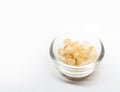 Beautiful Natural Citrine stone in glass cup on white Background