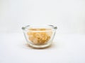 Beautiful Natural Citrine stone in glass cup on white Background