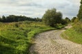 Beautiful natural european landscape along the river with a gravel path Royalty Free Stock Photo