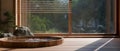 Beautiful natural Japanese Onsen spa with classic round wooden bath near the window