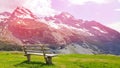Beautiful natural landscape summer mountain landscape with colorful sunset over snowy mountain range dolomite italy with wooden Royalty Free Stock Photo