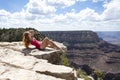 Beautiful natural landscape. Woman in Grand Canyon. USA traveling. World national landmark. Royalty Free Stock Photo