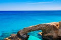 Beautiful natural rock arch near of Ayia Napa, Cavo Greco and Protaras on Cyprus island, Mediterranean Sea. Legendary bridge Royalty Free Stock Photo